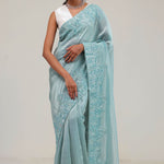 Light Turquoise Tissue Saree With Embroidery Detail