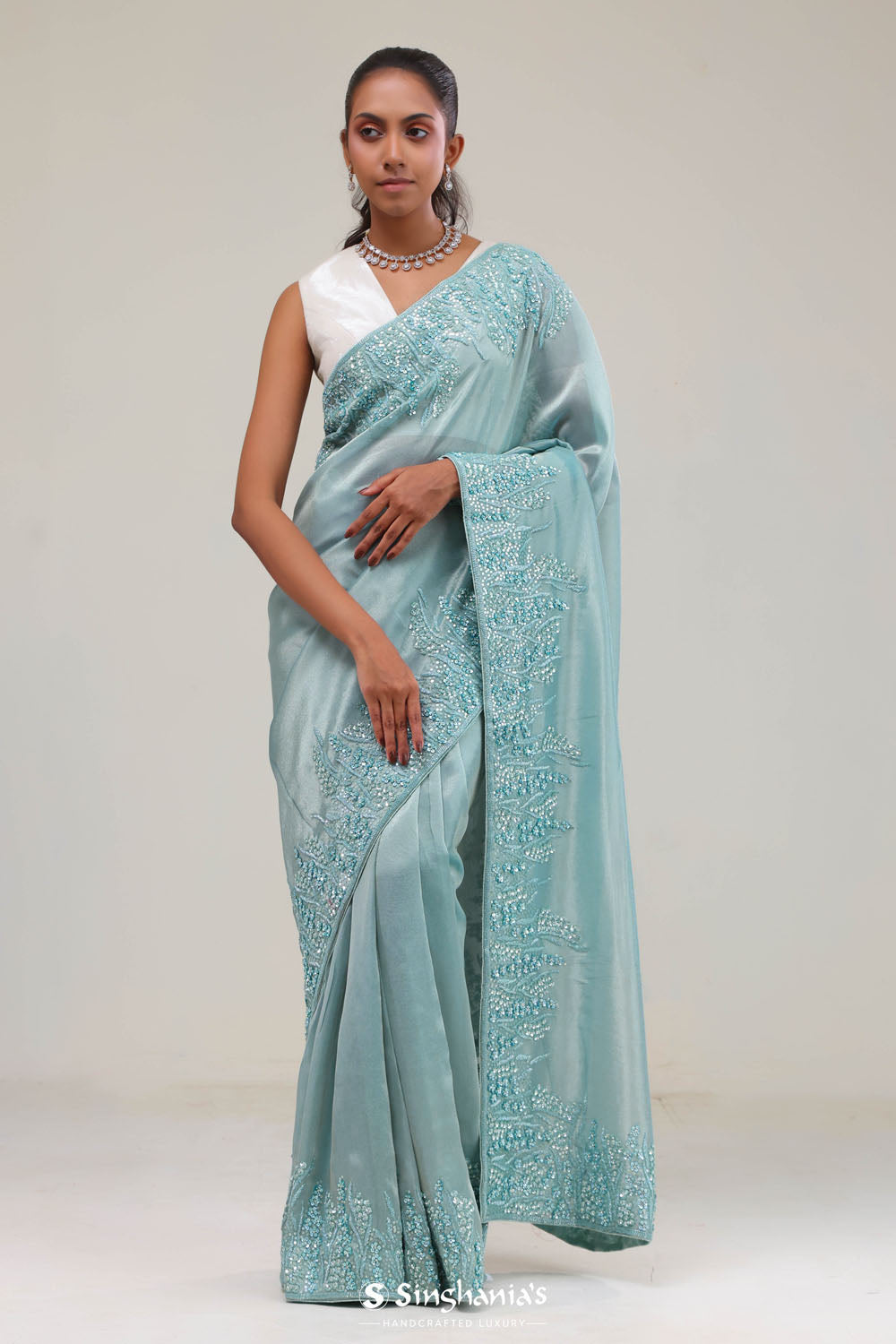 Light Turquoise Tissue Saree With Embroidery Detail