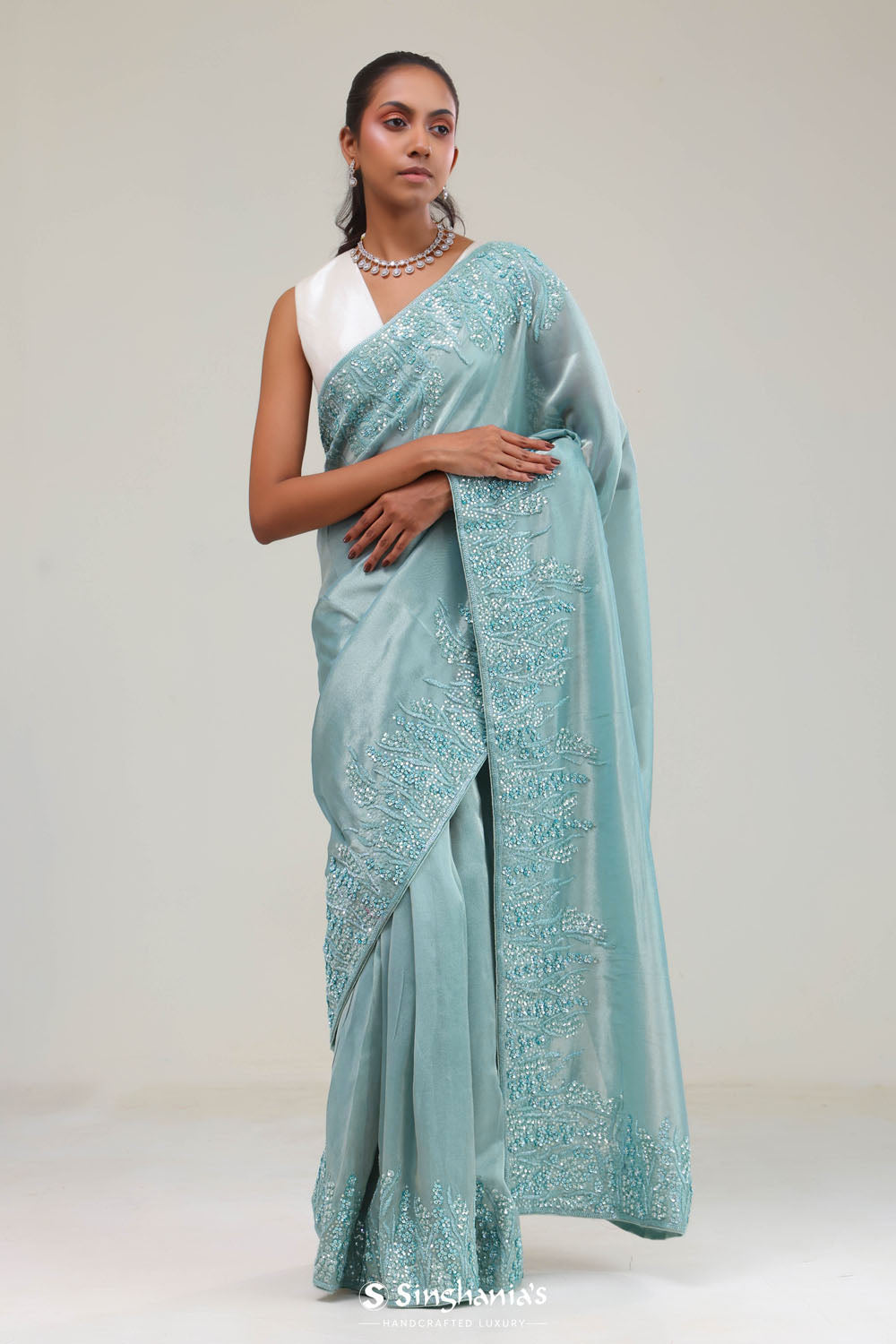 Light Turquoise Tissue Saree With Embroidery Detail