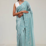Light Turquoise Tissue Saree With Embroidery Detail