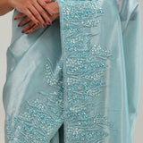 Light Turquoise Tissue Saree With Embroidery Detail