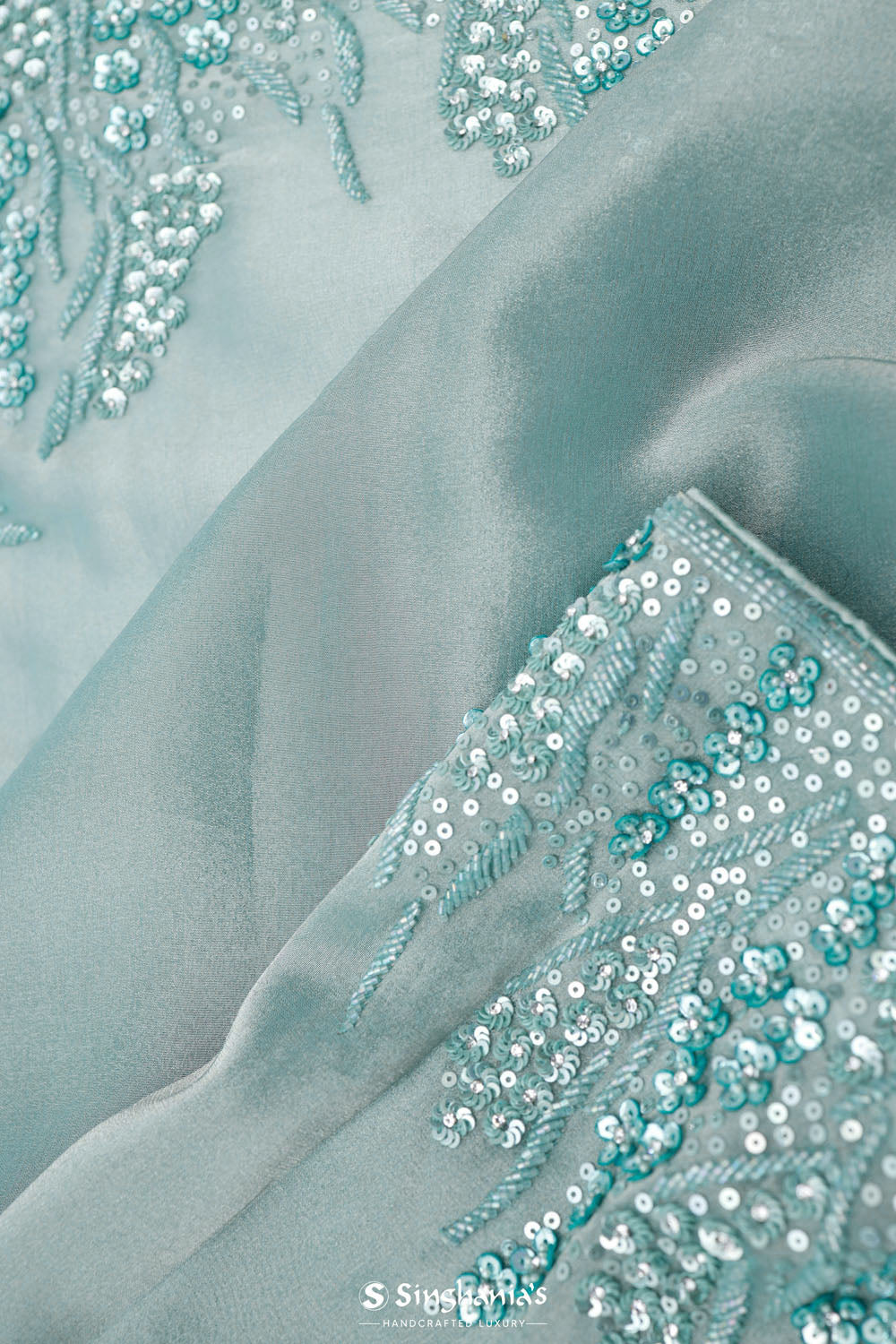 Light Turquoise Tissue Saree With Embroidery Detail
