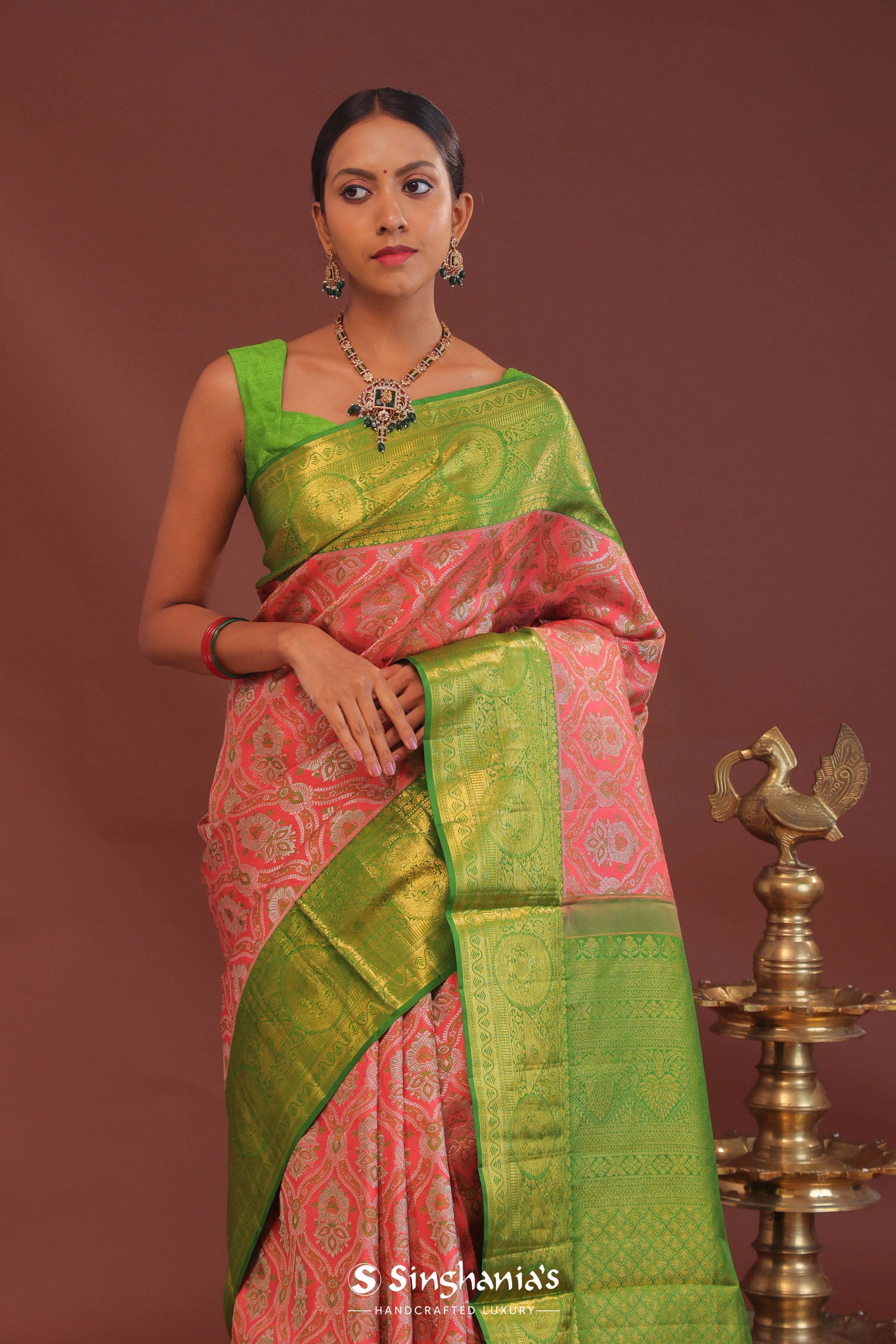 Georgia Peach Kanjivaram Saree With Contrast Light Green Border