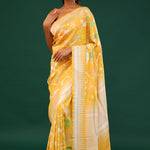 Tangarine Yellow Banarasi Tussar Saree With Floral Jaal