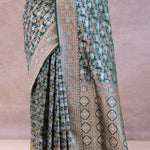Bottle Green Banarasi Silk Saree With Elephant And Leaf Motifs