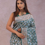 Bottle Green Banarasi Silk Saree With Elephant And Leaf Motifs