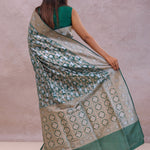 Bottle Green Banarasi Silk Saree With Elephant And Leaf Motifs