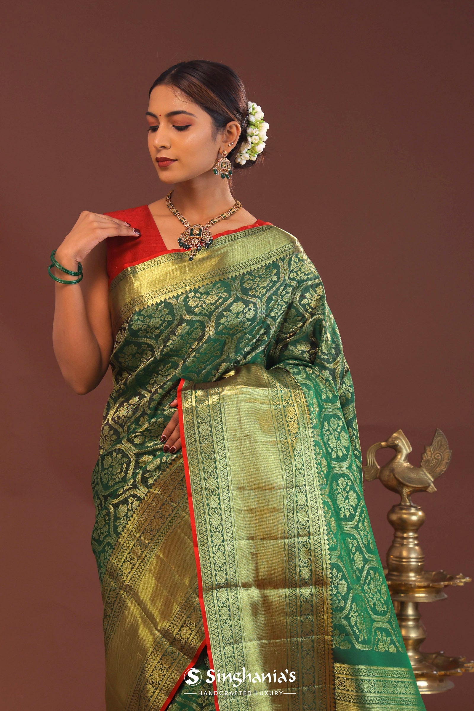 Bottle Green Kanjivaram Saree With Gold Zari Border