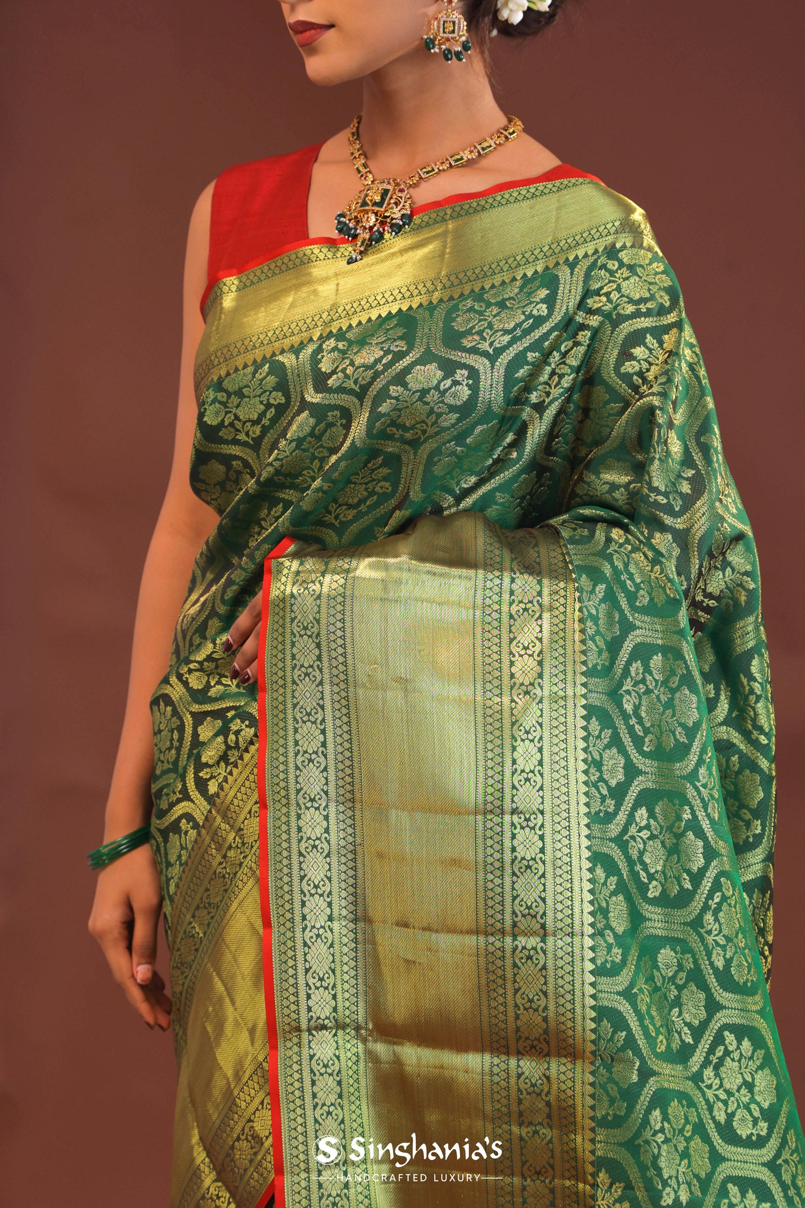 Bottle Green Kanjivaram Saree With Gold Zari Border