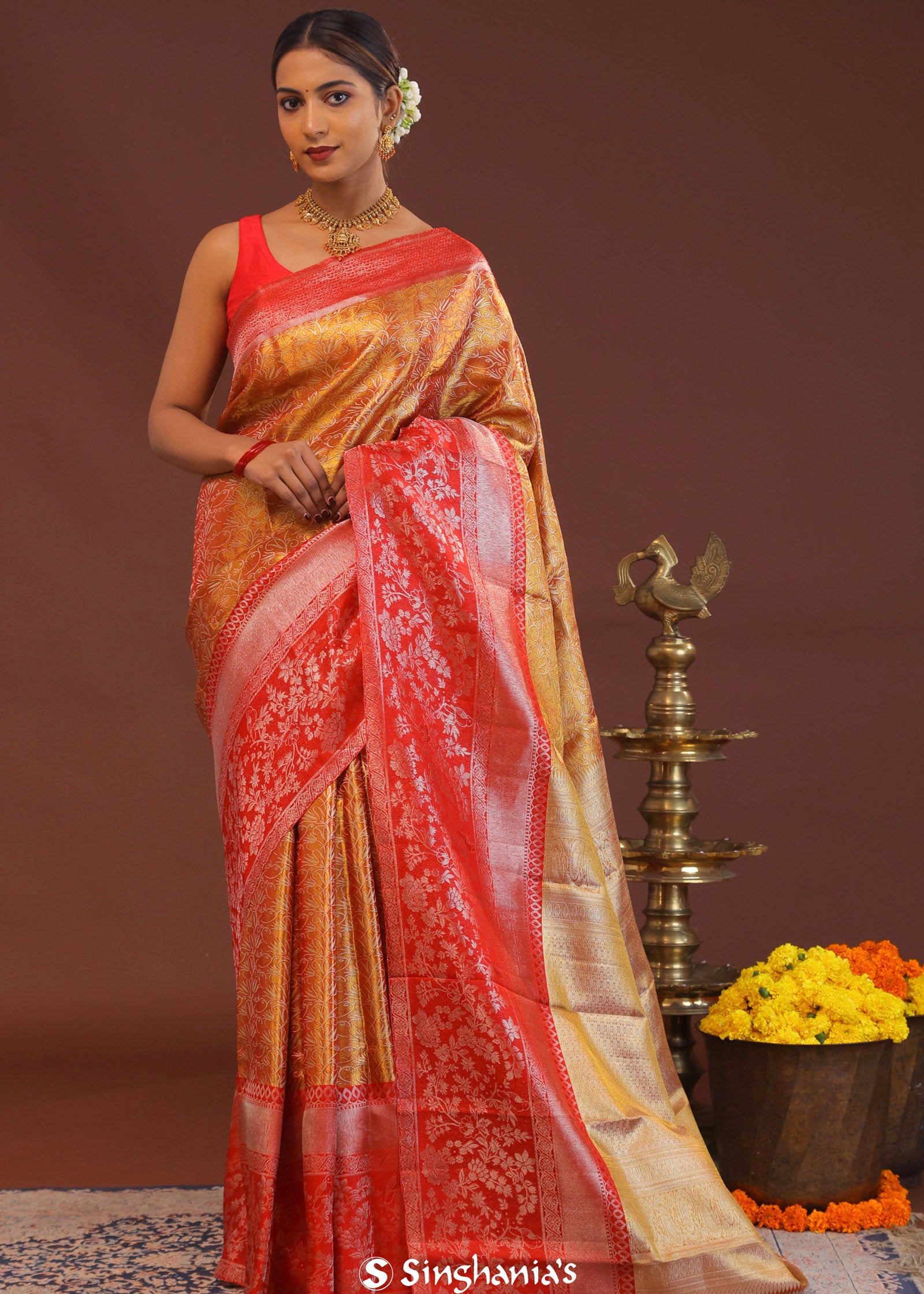 Orange Kanjivaram Tissue Saree With Contrast Red Border