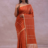 Burnt Orange Mashru Banarasi Silk With Gold Zari Stripes