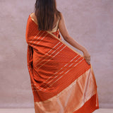 Burnt Orange Mashru Banarasi Silk With Gold Zari Stripes