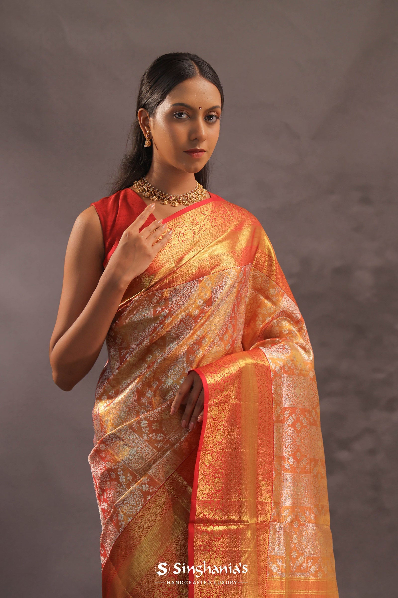 Orange Kanjivaram Silk Saree With Gold Zari Border