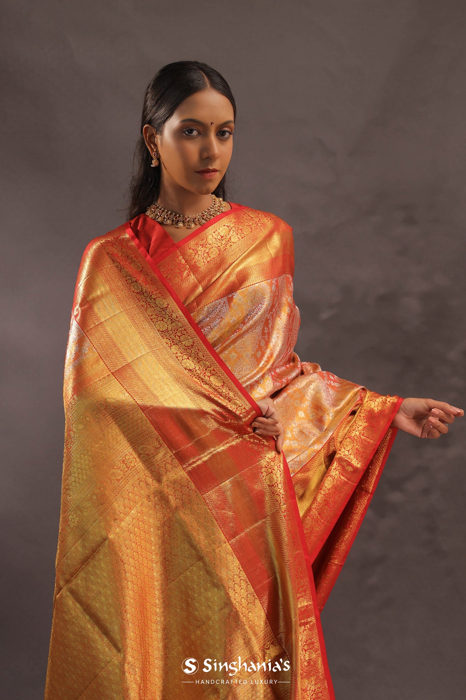 Orange Kanjivaram Silk Saree With Gold Zari Border