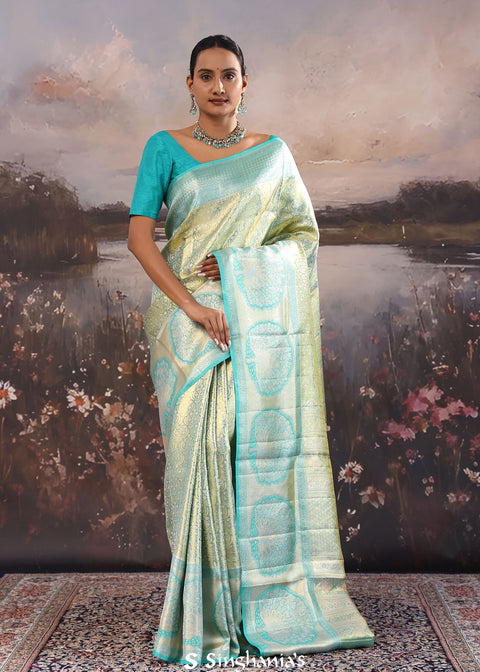 <img> Turquoise Blue Kanjivaram Tissue Saree With Contrast Border
