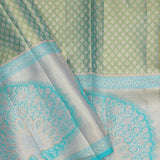 Turquoise Blue Kanjivaram Tissue Saree With Contrast Border