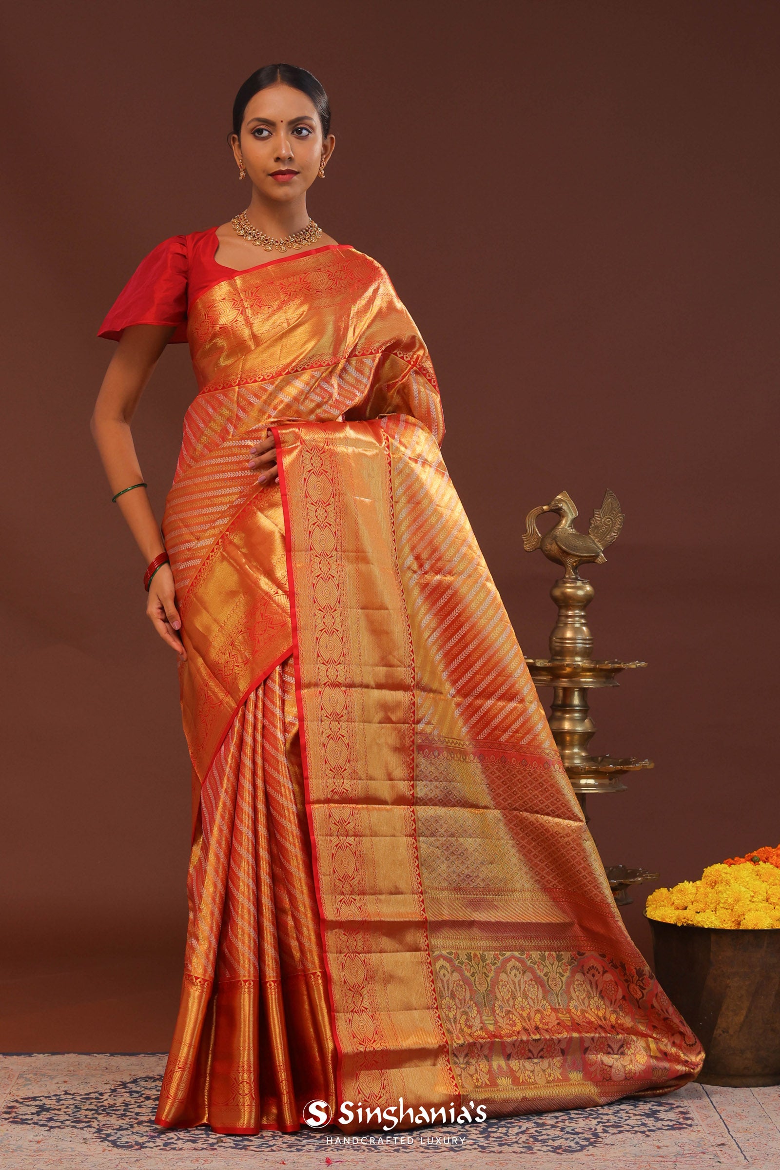 Orange Kanjivaram Saree With Gold Zari Work And Gold And Silver Zari Design