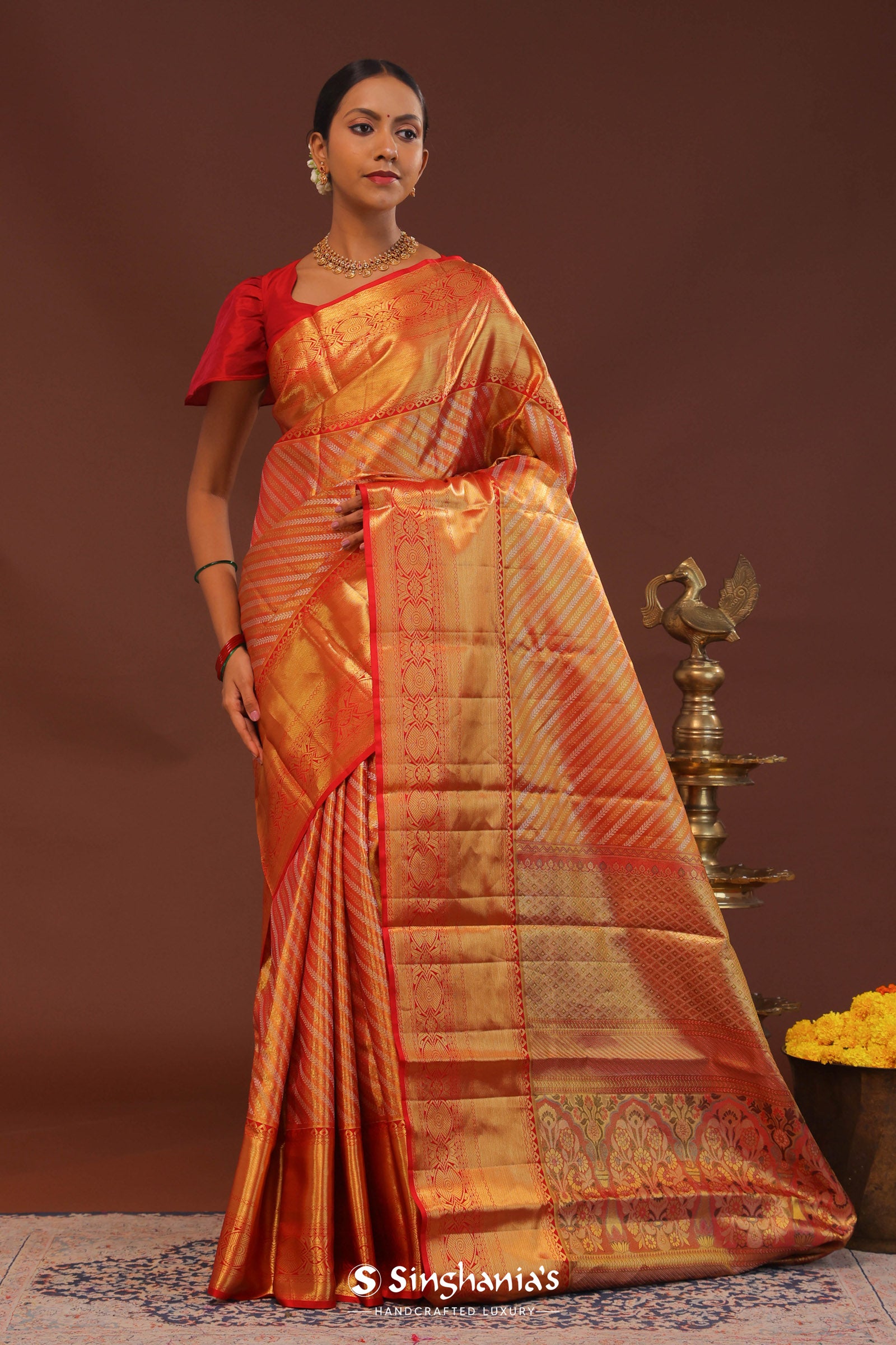 Orange Kanjivaram Saree With Gold Zari Work And Gold And Silver Zari Design
