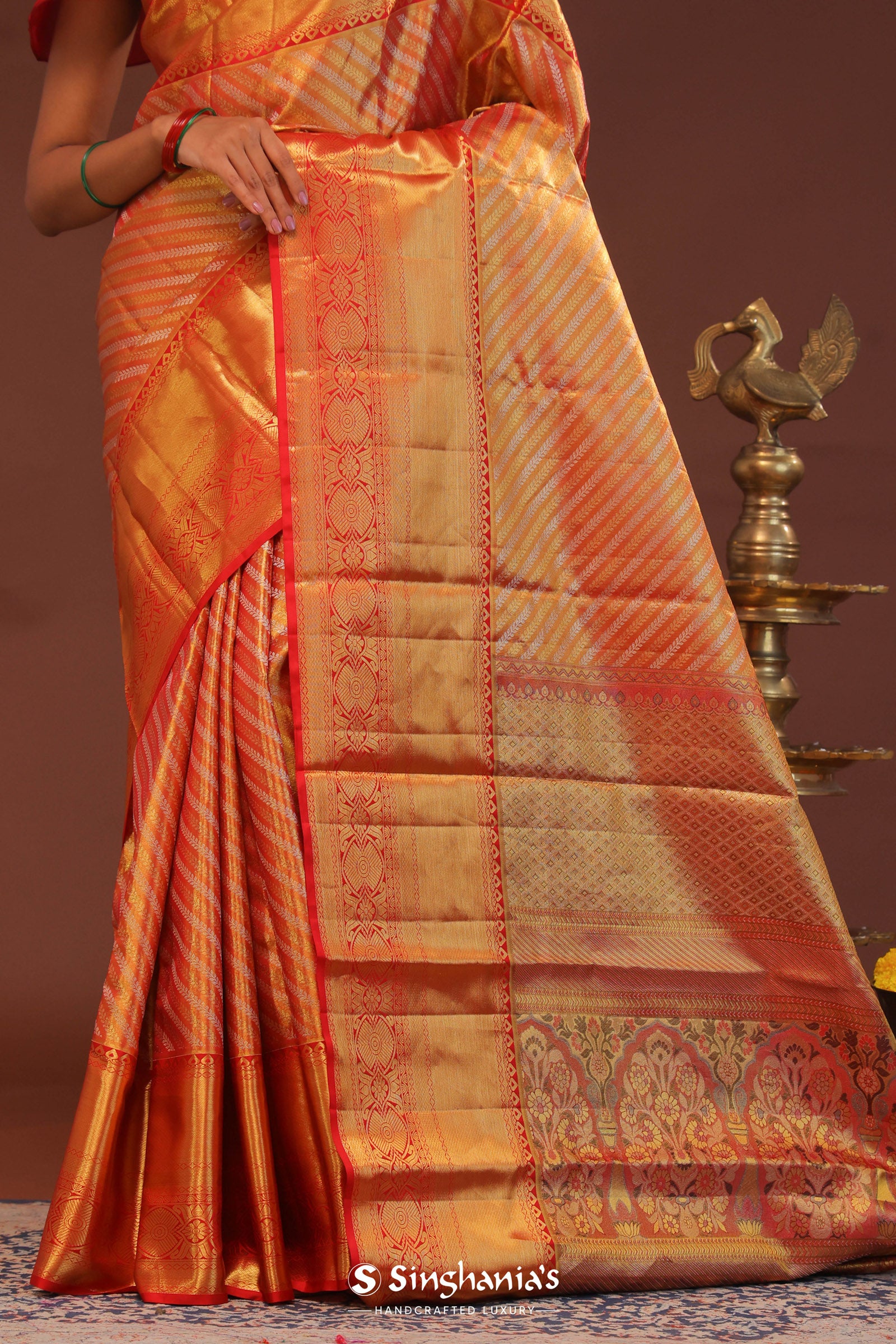 Orange Kanjivaram Saree With Gold Zari Work And Gold And Silver Zari Design