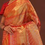 Orange Kanjivaram Saree With Gold Zari Work And Gold And Silver Zari Design