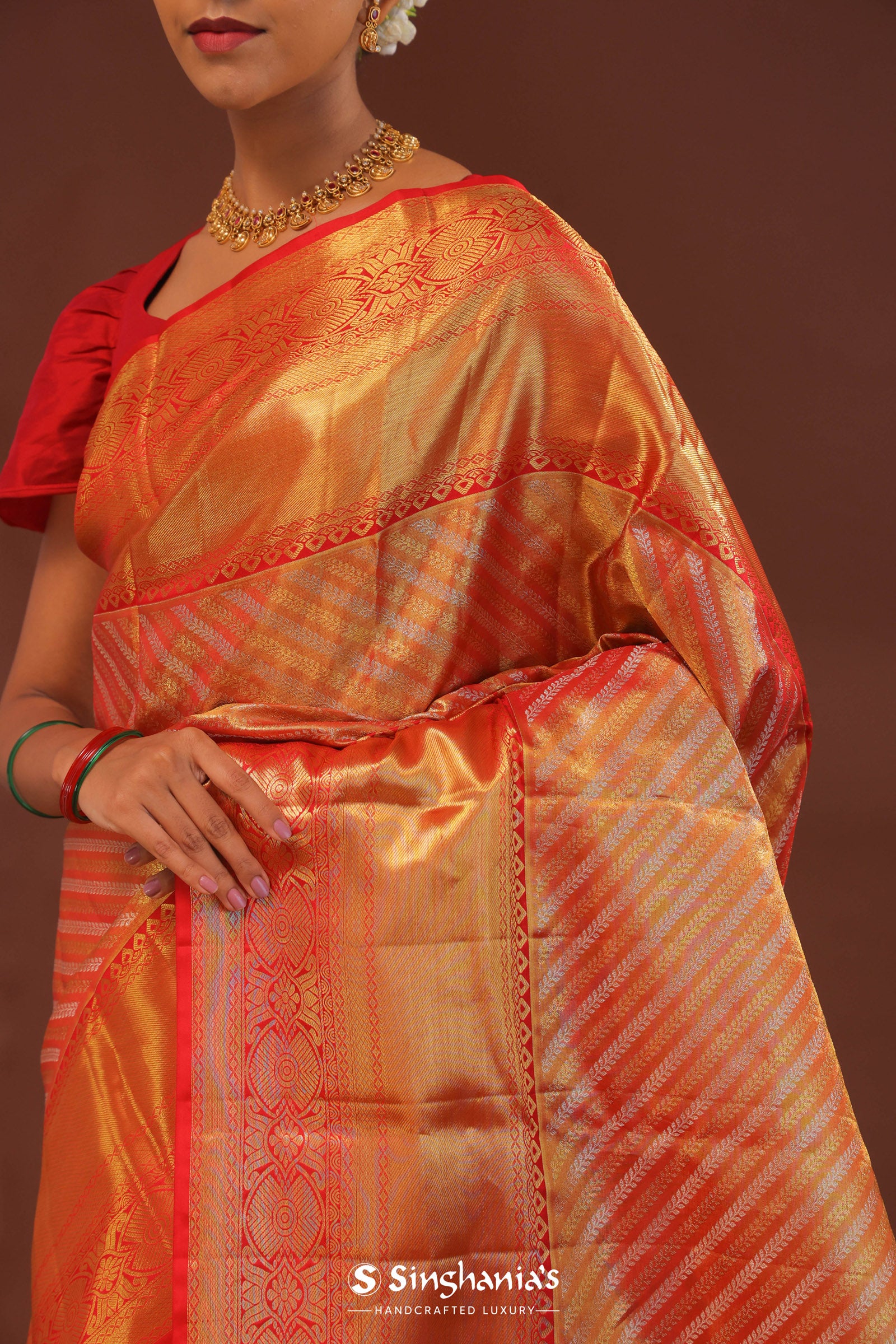 Orange Kanjivaram Saree With Gold Zari Work And Gold And Silver Zari Design