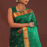 Bottle Green Kanjivaram Saree With Gold Zari Border
