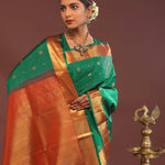 Bottle Green Kanjivaram Saree With Gold Zari Border