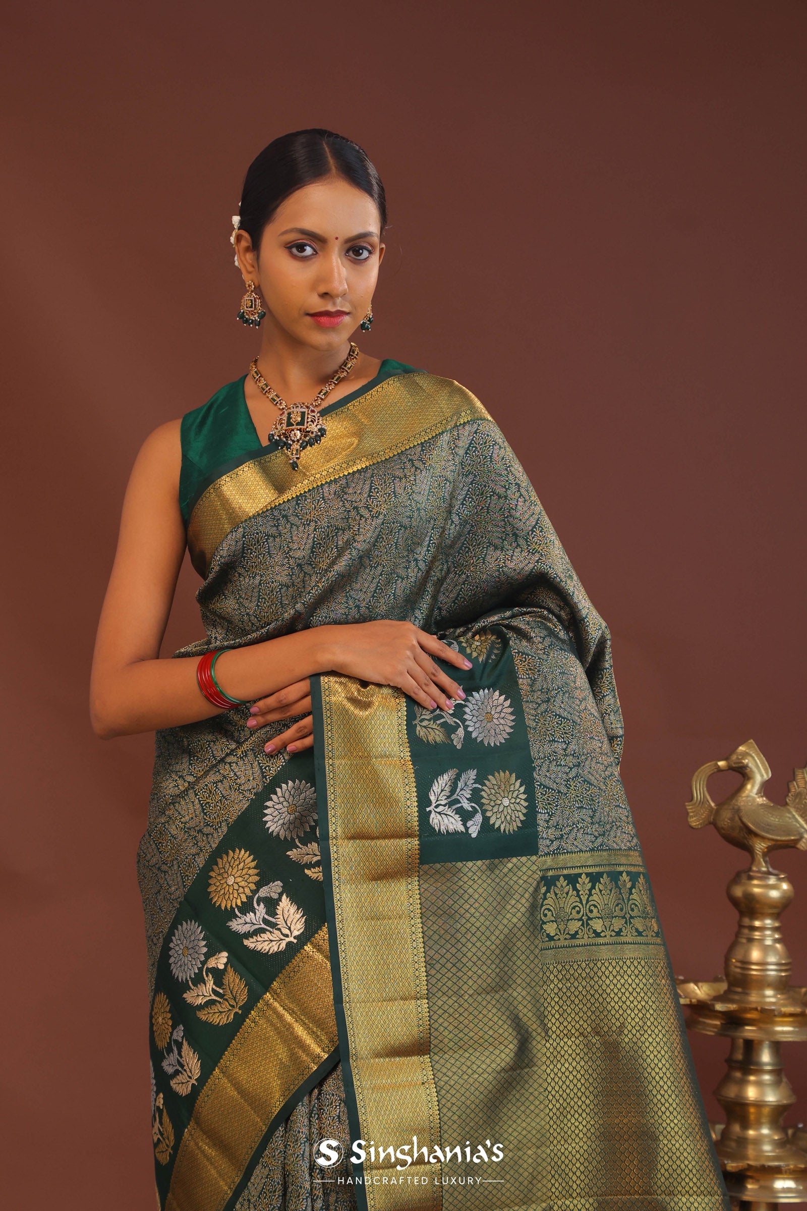 Dark Green Kanjivaram Saree With Leaf Jaal And Gold Zari Border