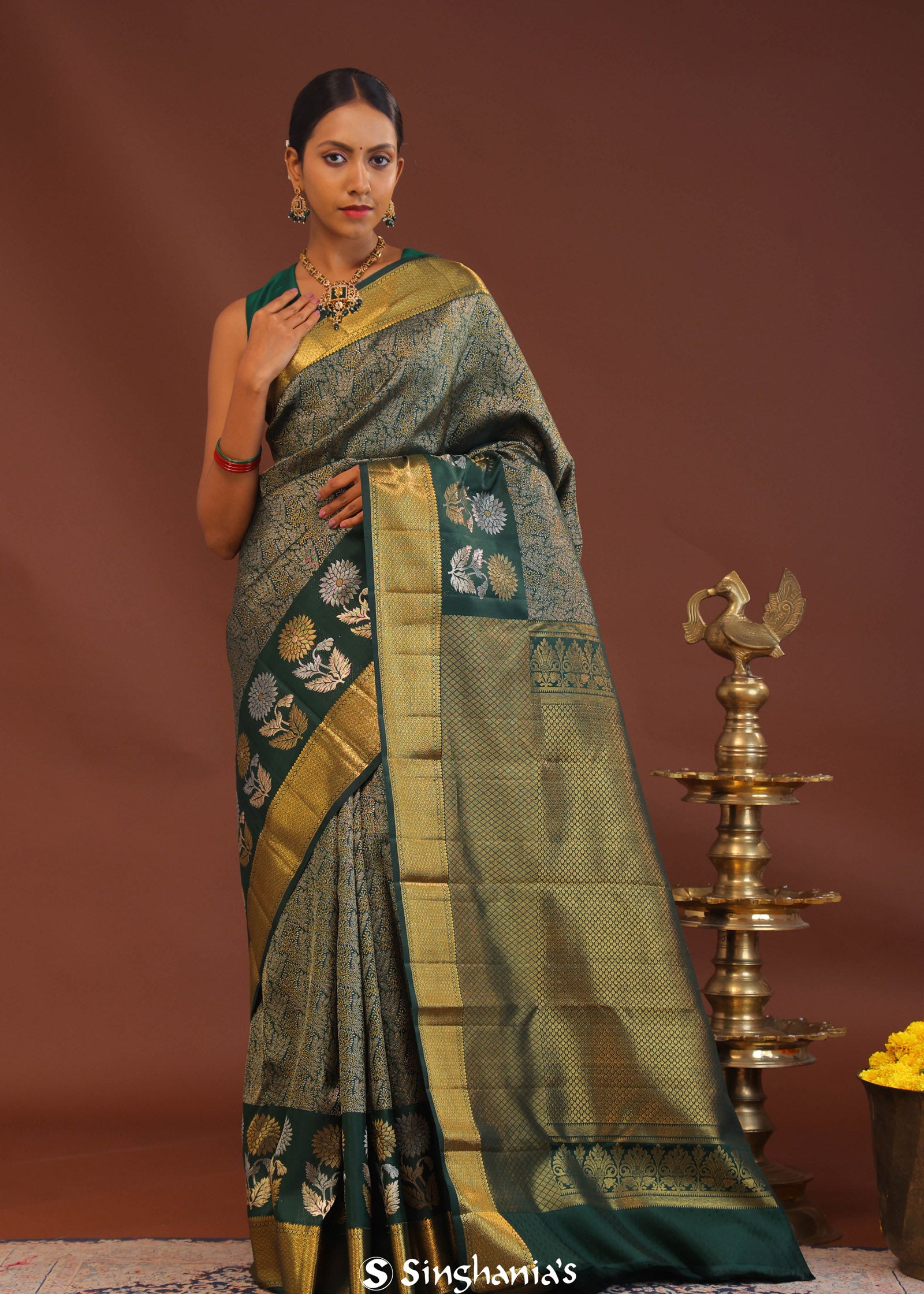 Dark Green Kanjivaram Saree With Leaf Jaal And Gold Zari Border