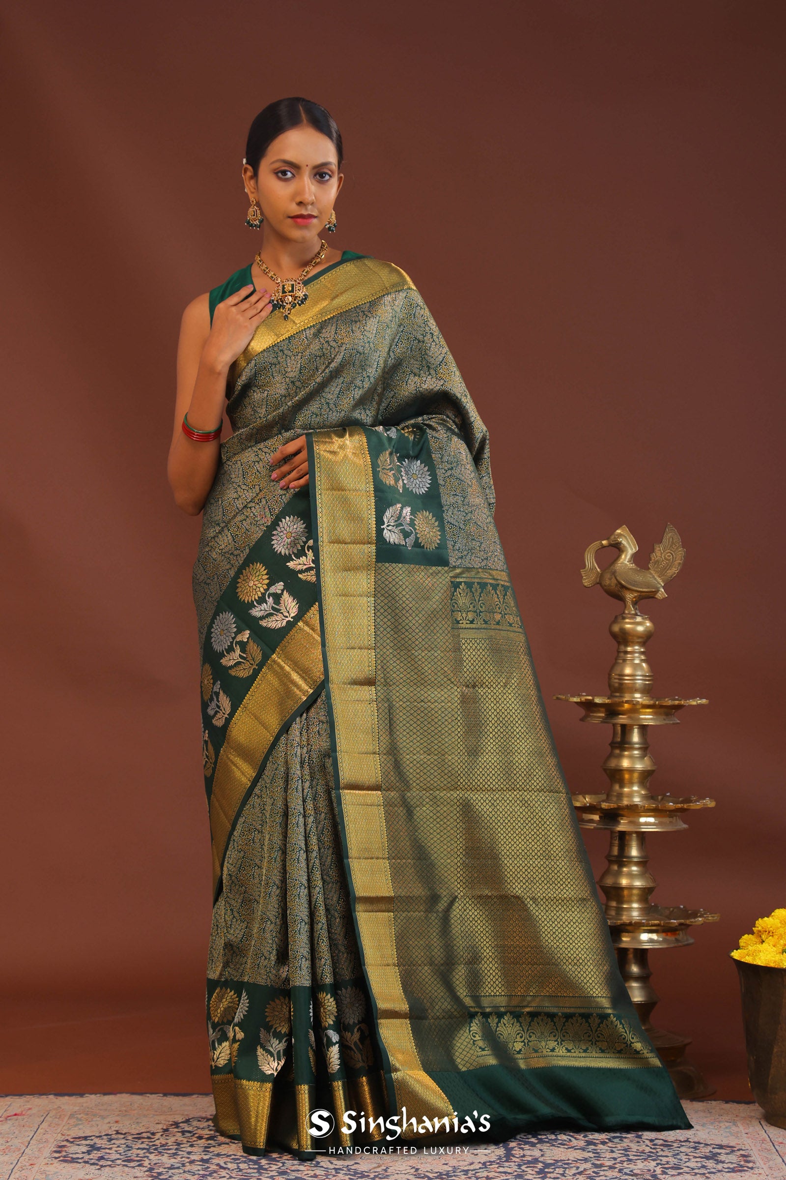 Dark Green Kanjivaram Saree With Leaf Jaal And Gold Zari Border
