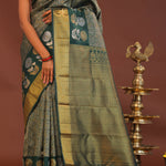 Dark Green Kanjivaram Saree With Leaf Jaal And Gold Zari Border