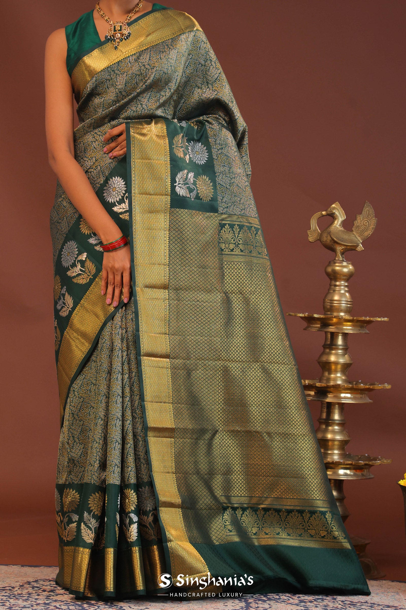 Dark Green Kanjivaram Saree With Leaf Jaal And Gold Zari Border