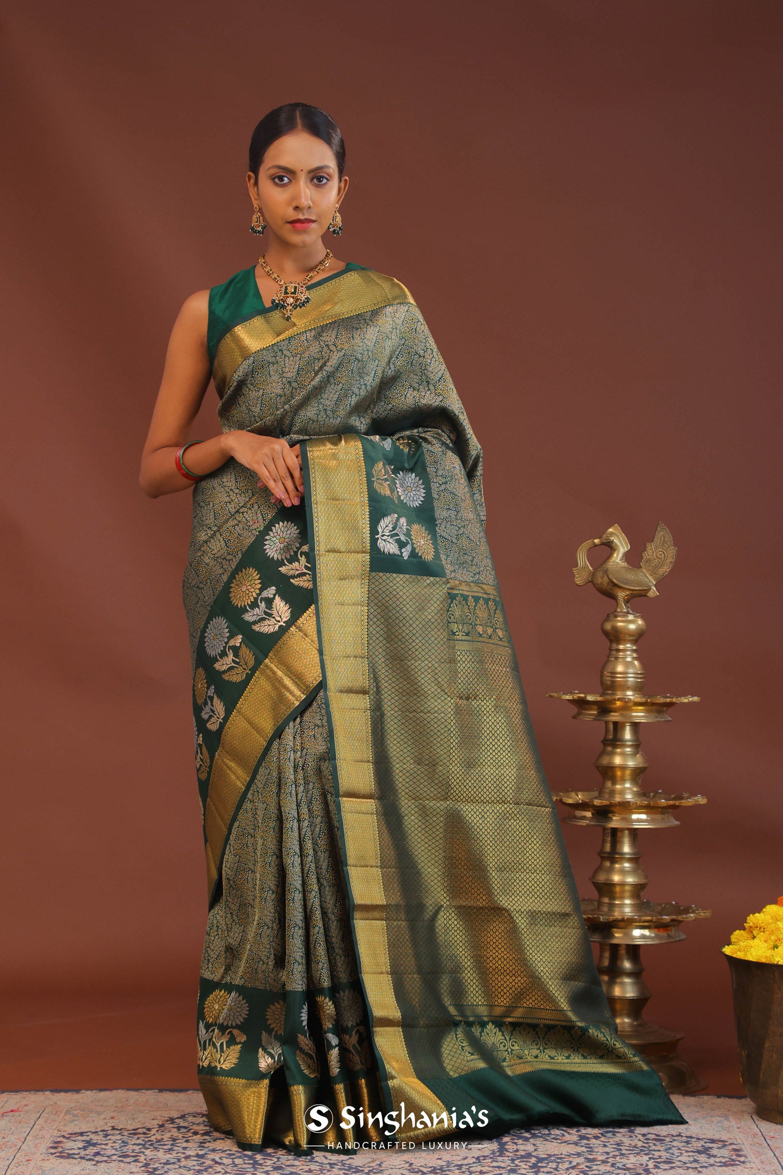 Dark Green Kanjivaram Saree With Leaf Jaal And Gold Zari Border