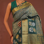 Dark Green Kanjivaram Saree With Leaf Jaal And Gold Zari Border