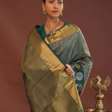 Dark Green Kanjivaram Saree With Leaf Jaal And Gold Zari Border
