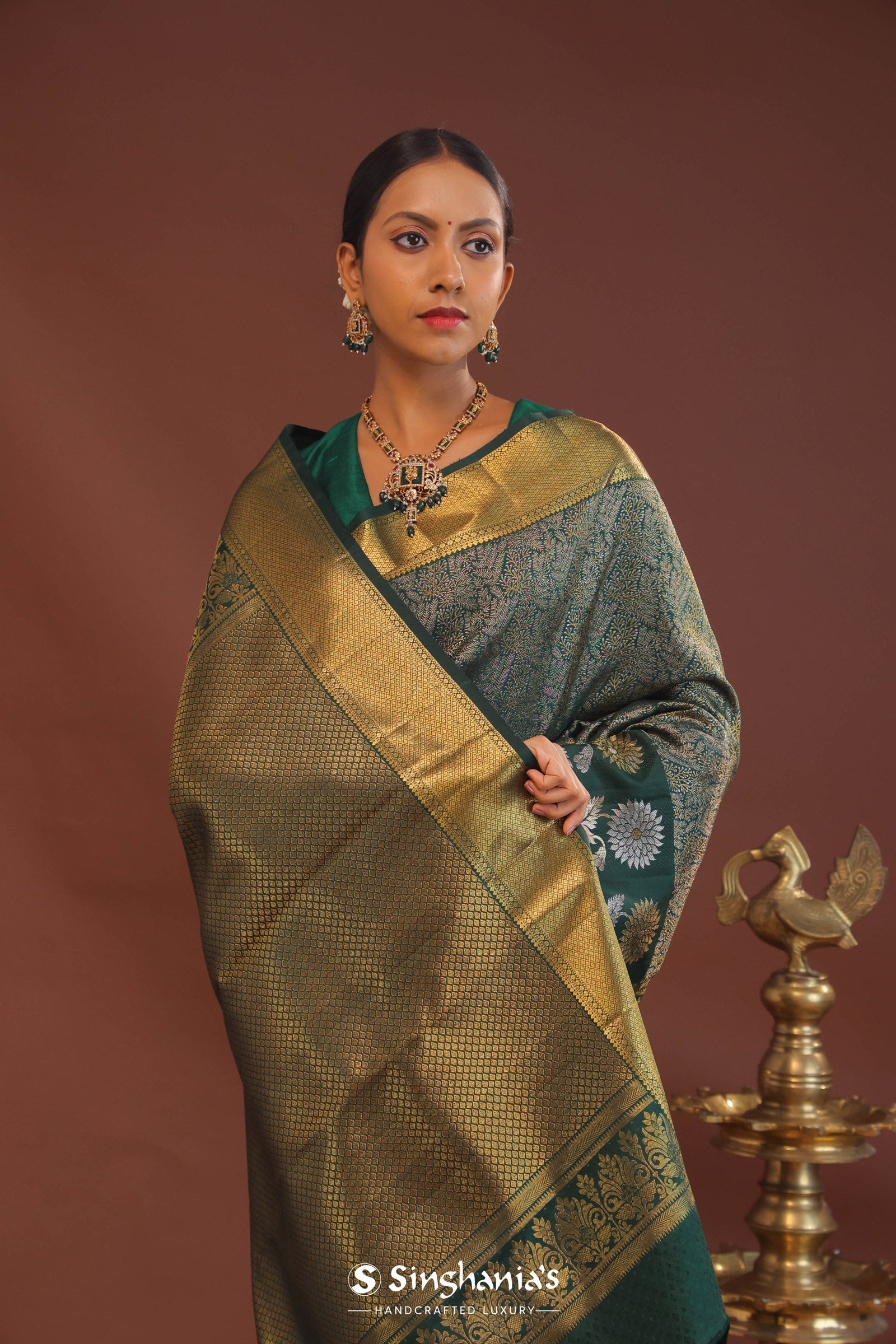 Dark Green Kanjivaram Saree With Leaf Jaal And Gold Zari Border