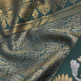 Dark Green Kanjivaram Saree With Leaf Jaal And Gold Zari Border