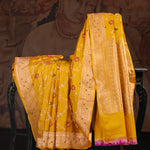Vibrant Yellow Banarasi Silk Saree Adorned With Floral Embroidery