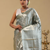 Dark Green Kanjivaram Tissue Saree With Floral Design