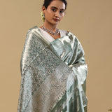 Dark Green Kanjivaram Tissue Saree With Floral Design