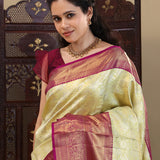 Pastel Green Kanjivaram Saree With Contrast Border.