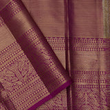 Pastel Green Kanjivaram Saree With Contrast Border.