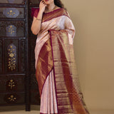 Pastel Pink Kanjivaram Saree With Contrast Border.
