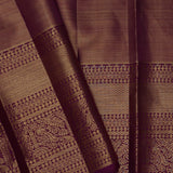 Pastel Pink Kanjivaram Saree With Contrast Border.