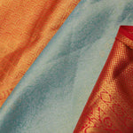 Pistachio Green Kanjivaram Tissue Silk Saree With Vibrant Orange Border