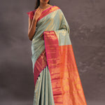 Soft Pistachio Kanjivaram Tissue Silk Saree With Purple Border