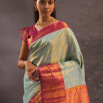 Soft Pistachio Kanjivaram Tissue Silk Saree With Purple Border