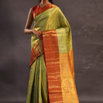 Soft Lime Green Kanjivaram Tissue Silk Saree With Bright Orange Border