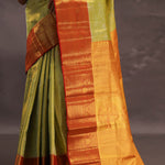 Soft Lime Green Kanjivaram Tissue Silk Saree With Bright Orange Border