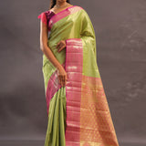 Lime Green Kanjivaram Tissue Silk Saree With Contrast Megenta Border